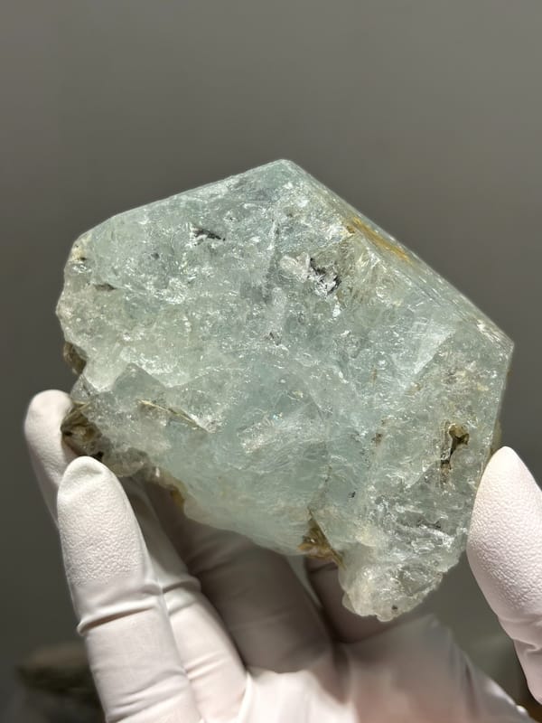 Pale blue-green aquamarine block from Xuebaoding, Sichuan, China, reverse side