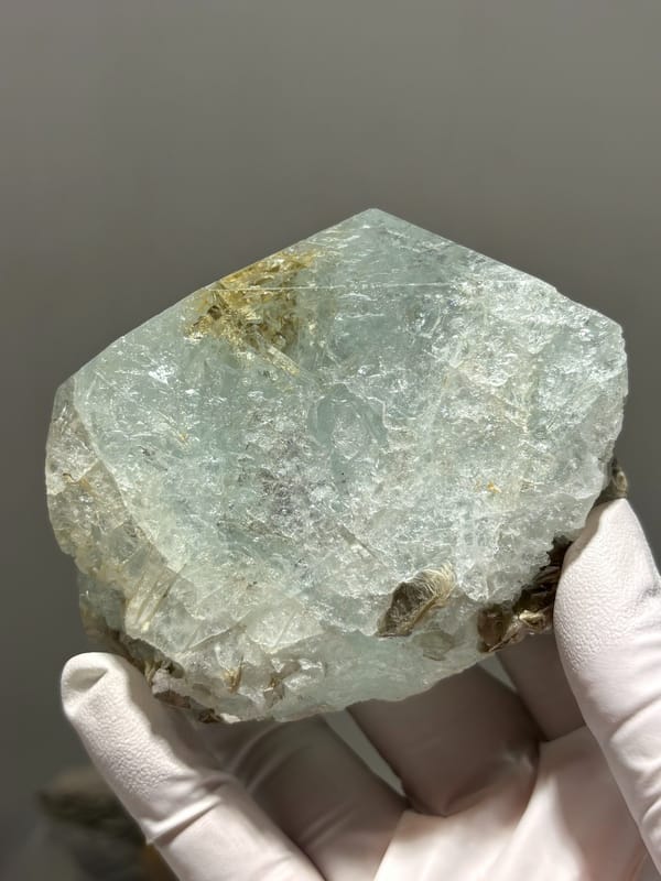 Pale blue-green aquamarine block from Xuebaoding, Sichuan, China, close-up of terminations