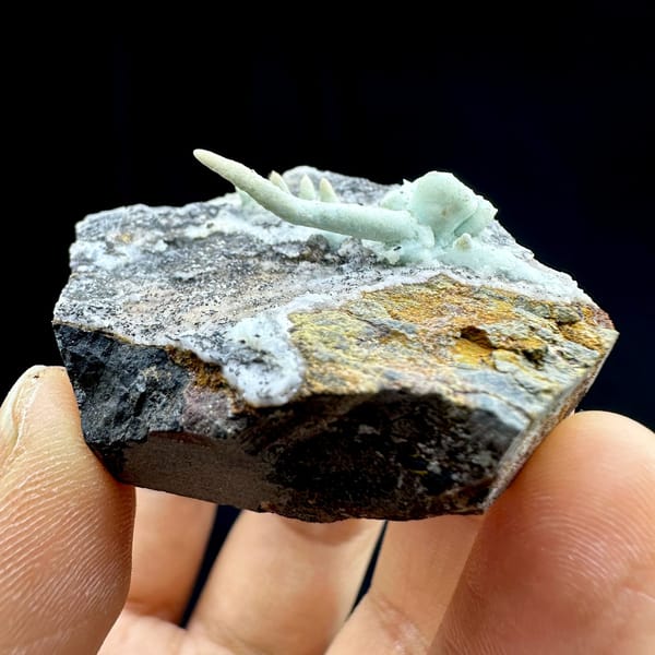 Pale blue aragonite finger on grey rock wedge from Yunnan, China, view 2 of 6