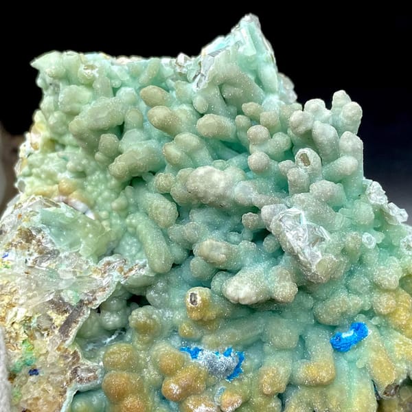 Pale blue botryoidal hemimorphite wrapping quartz from Yunnan, China, view 5 of 9