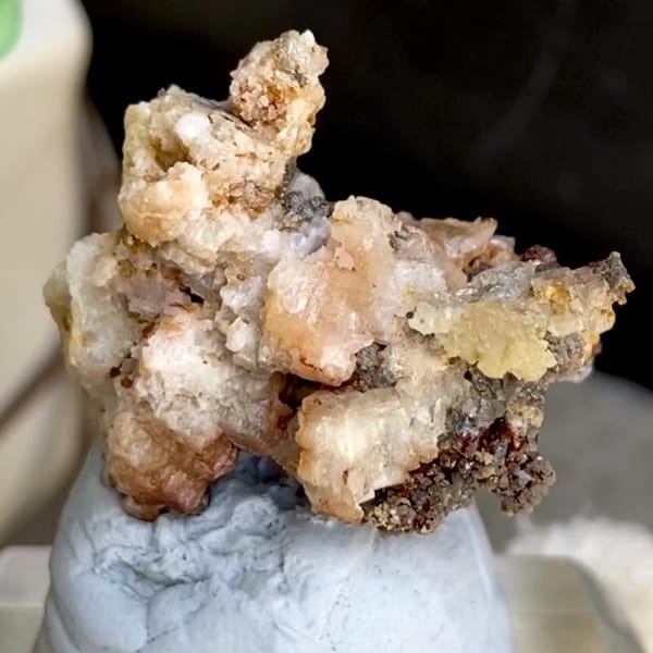 Pale cerussite crystals on rusty matrix from Guangxi, China