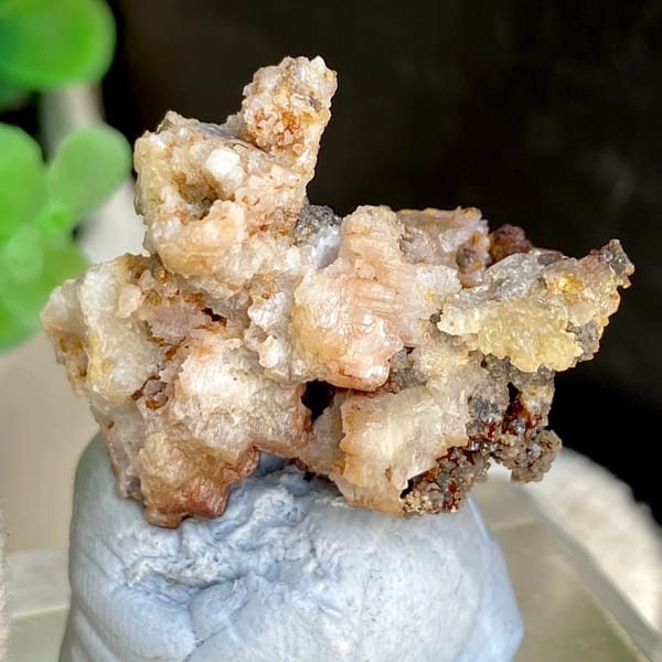 Pale cerussite crystals on rusty matrix from Guangxi, China, view 2 of 6