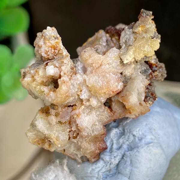 Pale cerussite crystals on rusty matrix from Guangxi, China, view 3 of 6