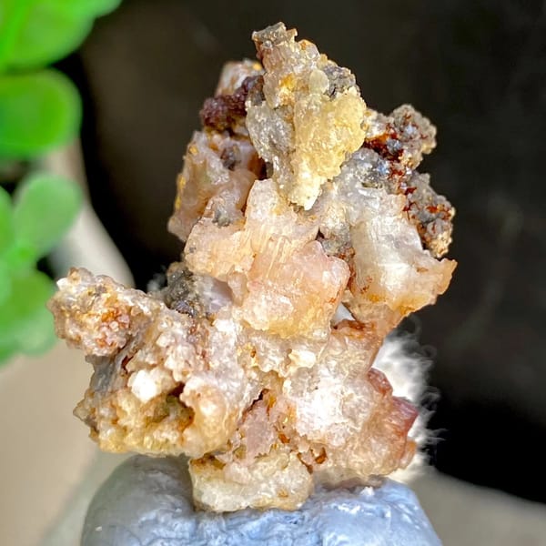 Pale cerussite crystals on rusty matrix from Guangxi, China, view 5 of 6
