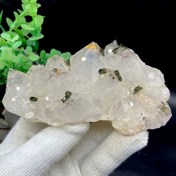 Pale quartz points dusted with green epidote from Sichuan, China, view 2 of 9