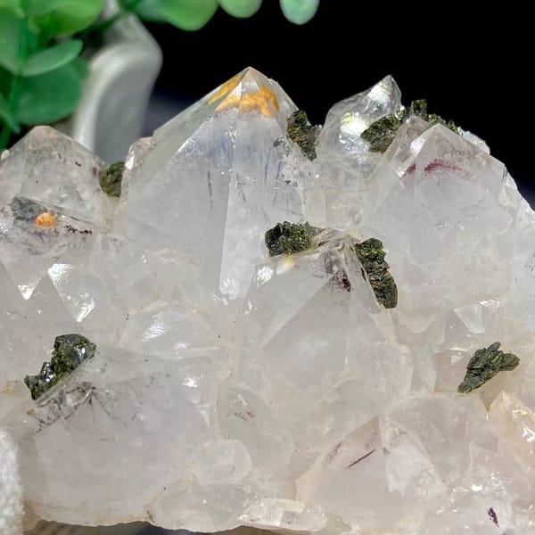 Pale quartz points dusted with green epidote from Sichuan, China, view 5 of 9