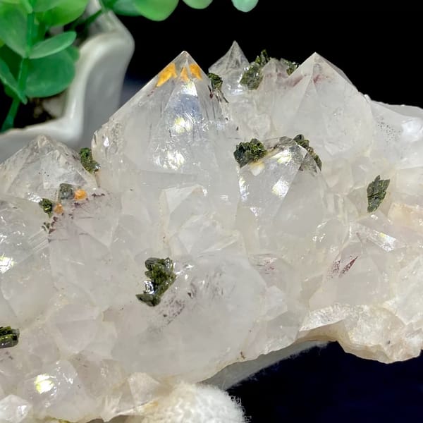 Pale quartz points dusted with green epidote from Sichuan, China, view 9 of 9