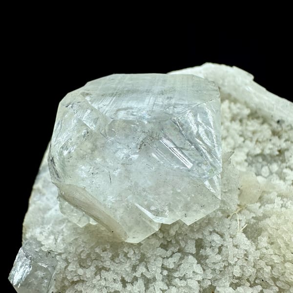 Large pale-green apophyllite crystals on white zeolite druse from India, view 2 of 6