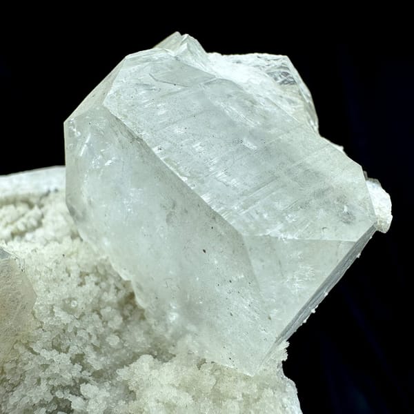 Large pale-green apophyllite crystals on white zeolite druse from India, view 5 of 6