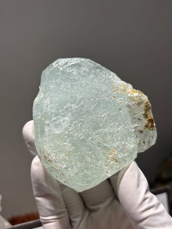 Pale green aquamarine plate from Xuebaoding, Sichuan, China, close-up of the crystal faces