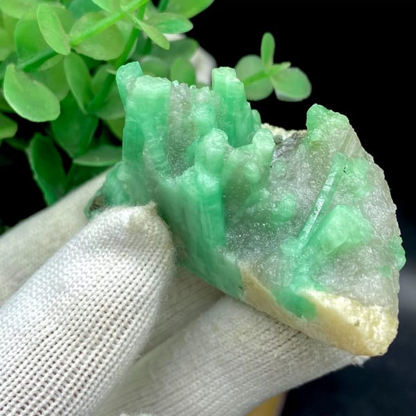 Pale green emerald crystals on rounded beryl matrix from Yunnan, China, view 4 of 9