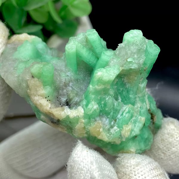 Pale green emerald crystals on rounded beryl matrix from Yunnan, China, view 5 of 9