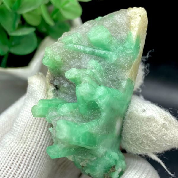 Pale green emerald crystals on rounded beryl matrix from Yunnan, China, view 6 of 9