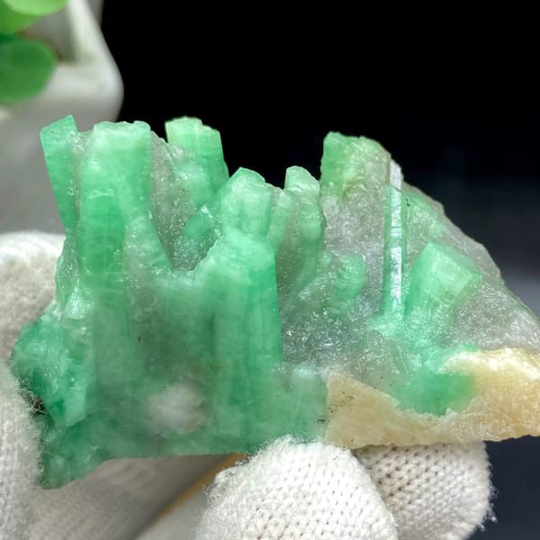 Pale green emerald crystals on rounded beryl matrix from Yunnan, China, view 9 of 9