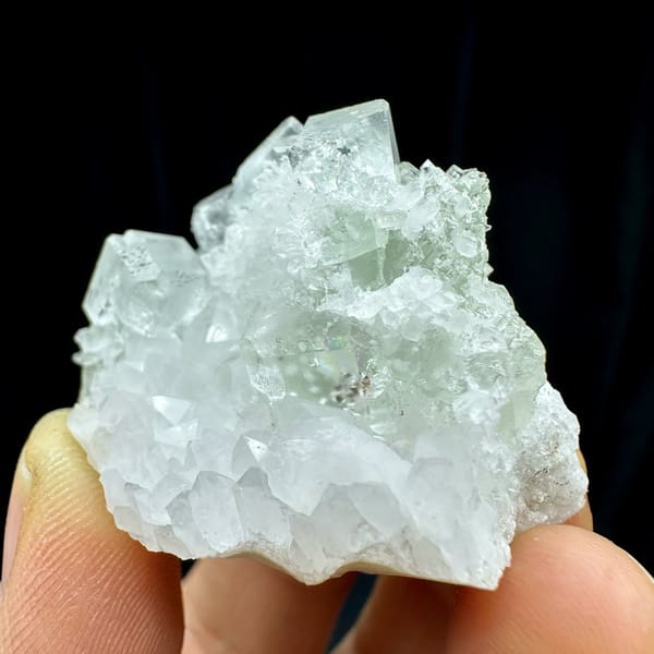 Pale green fluorite cubes among white quartz points from Guangdong, China, view 4 of 10