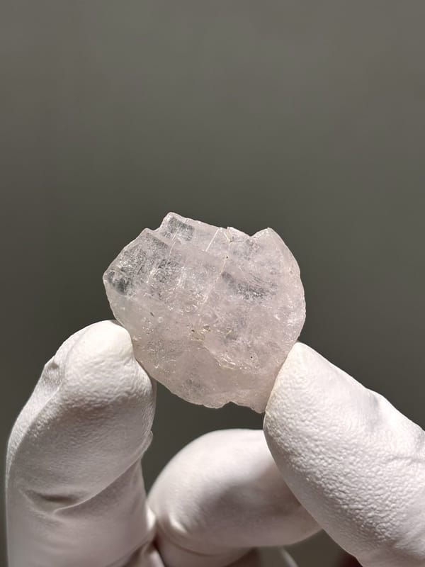 Pale lilac apatite tablet from Xuebaoding, Sichuan, China, view 3 of 4