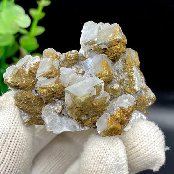 Pale pyramid calcite points with rusty pyrite film from Hunan, China, view 7 of 9