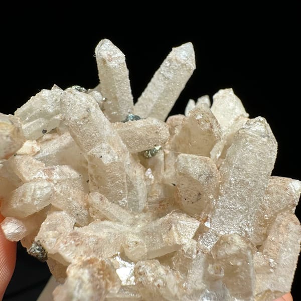 Pale quartz cluster with dark pyrite crystal from Inner Mongolia, China, view 3 of 11