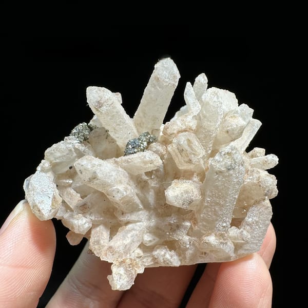 Pale quartz cluster with dark pyrite crystal from Inner Mongolia, China, view 8 of 11