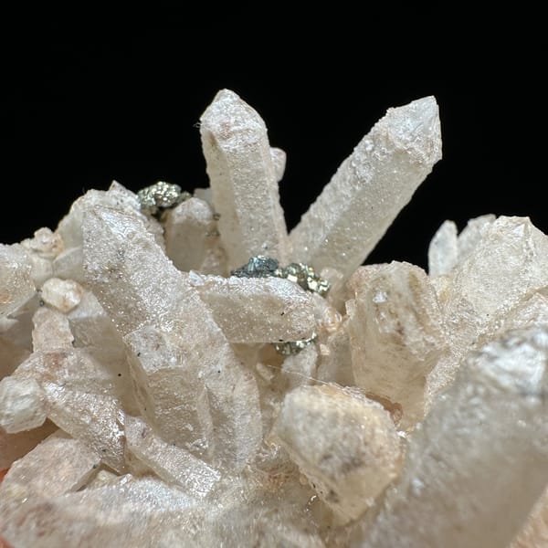Pale quartz cluster with dark pyrite crystal from Inner Mongolia, China, view 12 of 11