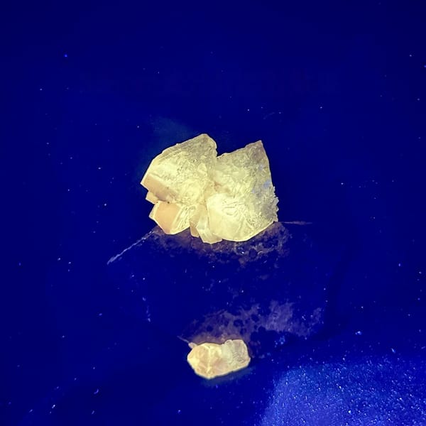 Large peach cerussite crystal on brown matrix from Morocco, view 2 of 6