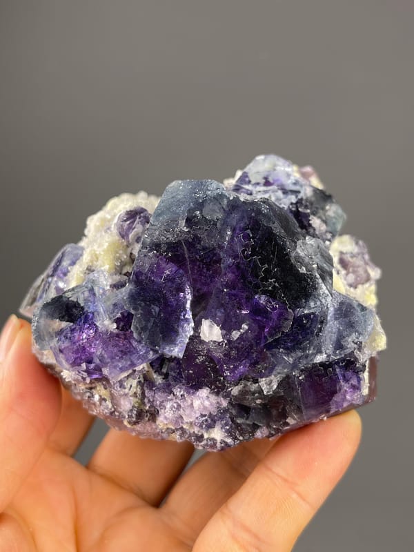 Phantom Fluorite specimen from Inner Mongolia, China featuring purple cubes in cream matrix