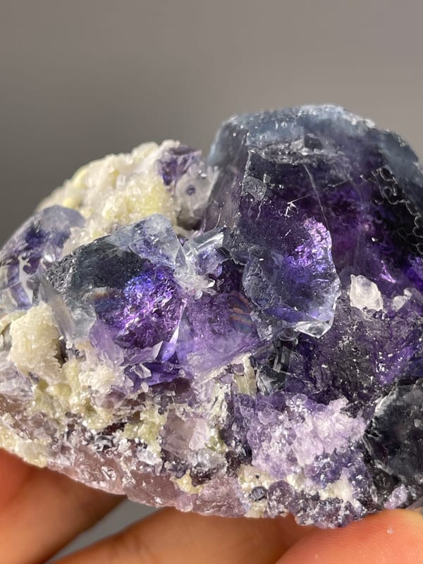 Purple cubes in cream matrix on natural phantom fluorite specimen from Inner Mongolia, China