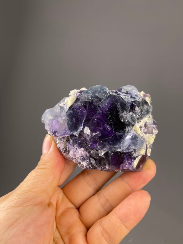 Phantom Fluorite specimen from Inner Mongolia, China, characterized by purple cubes in cream matrix