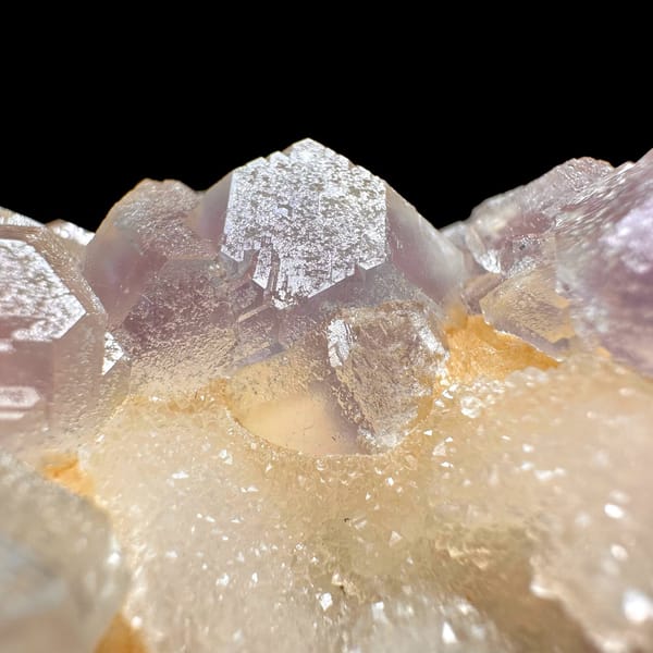 Pink-purple fluorite with quartz, from Jiangxi, China, front view in daylight, view 4 of 11