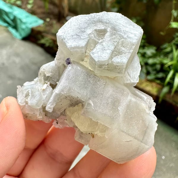 Prismatic calcite crystals, from Fujian, China, front view in daylight, view 4 of 12