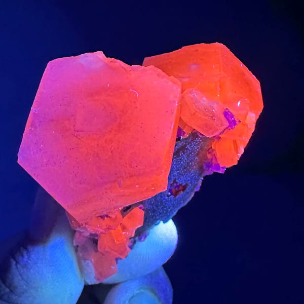 Prismatic calcite crystals, from Fujian, China, front view in daylight, view 5 of 12