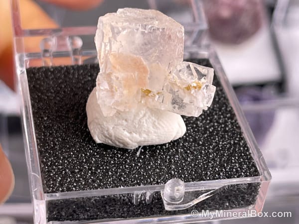 Bulk003 actual mixed mineral specimen box with about 35 different mini natural specimens, including likely fluorite, garnet, stibnite, quartz, aquamarine, tourmaline and grape agate.