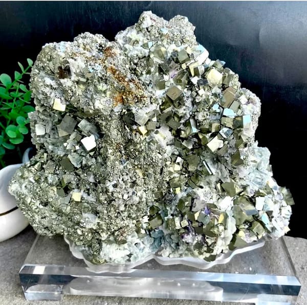 Large pyrite and green quartz display piece on stand from Shangbao, Hunan, China, detail of the matrix contact