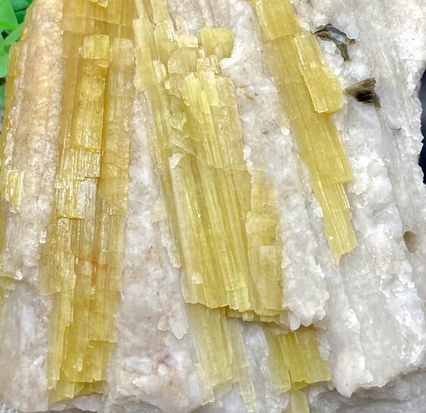 Block of golden topaz columns in white matrix from Germany, reverse side