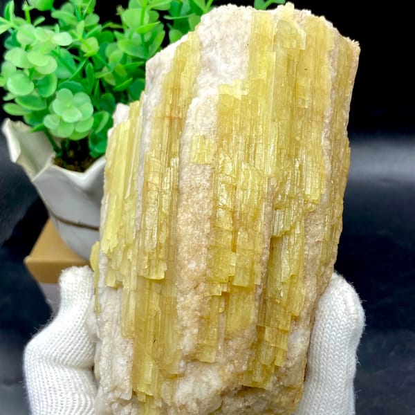 Block of golden topaz columns in white matrix from Germany, detail of the matrix contact