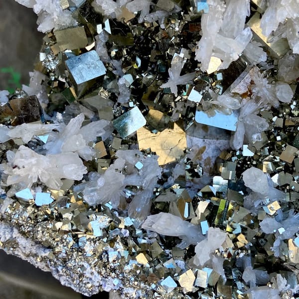 Large pyrite and quartz plate on stand from Shangbao, Hunan, China, close-up of terminations