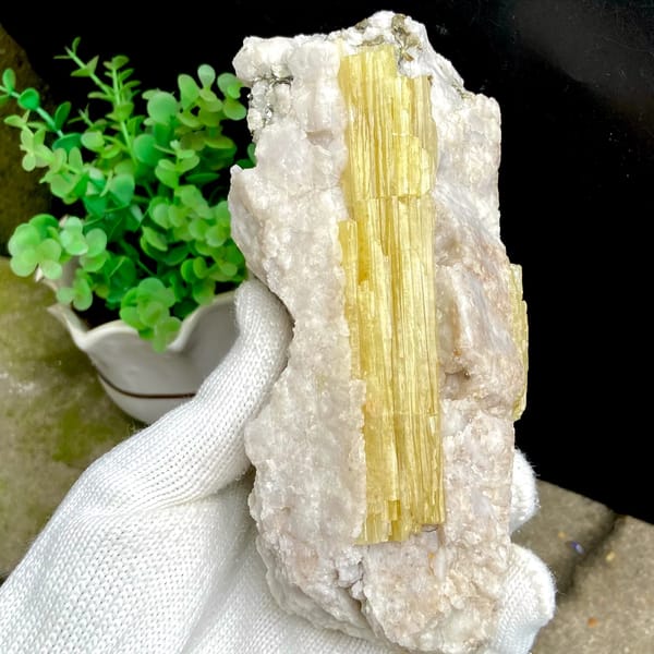 Block of golden prismatic topaz columns in white matrix from Germany, second angle
