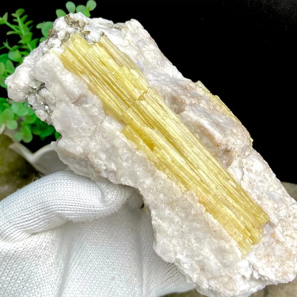 Block of golden prismatic topaz columns in white matrix from Germany, reverse side