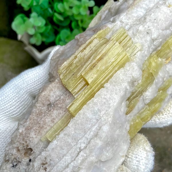 Block of golden prismatic topaz columns in white matrix from Germany, side view