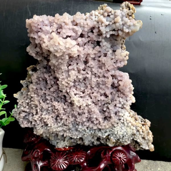 Tall tower of pearly lavender grape agate on stand from Indonesia