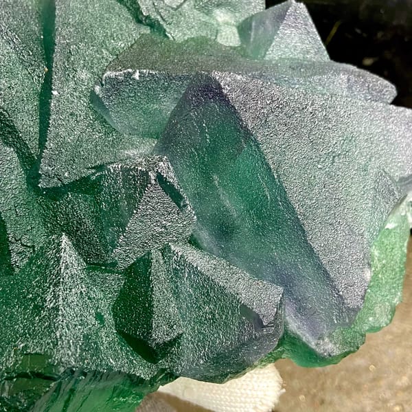 Tower of green fluorite octahedra with purple edges from Zhejiang, China, reverse side