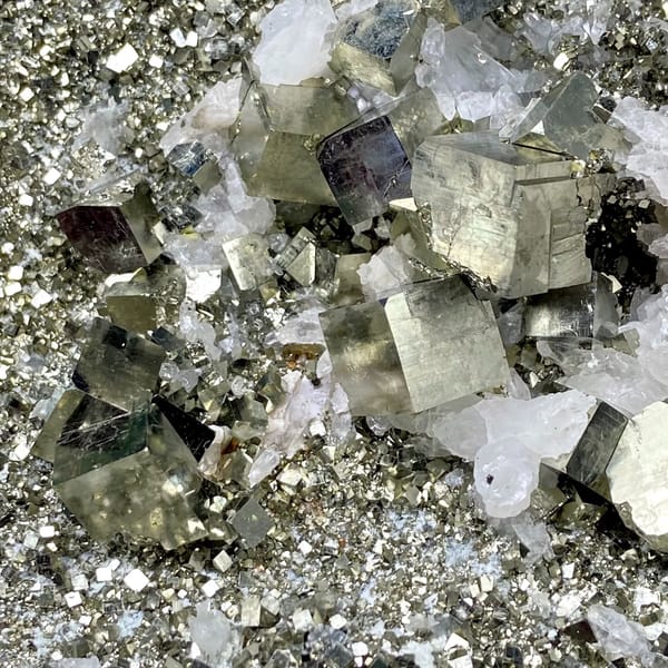 Tall tower of pyrite and white quartz on stand from Shangbao, Hunan, China, close-up of terminations