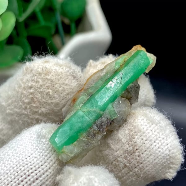 Green emerald beryl crystal on pale matrix from Yunnan — alternate view