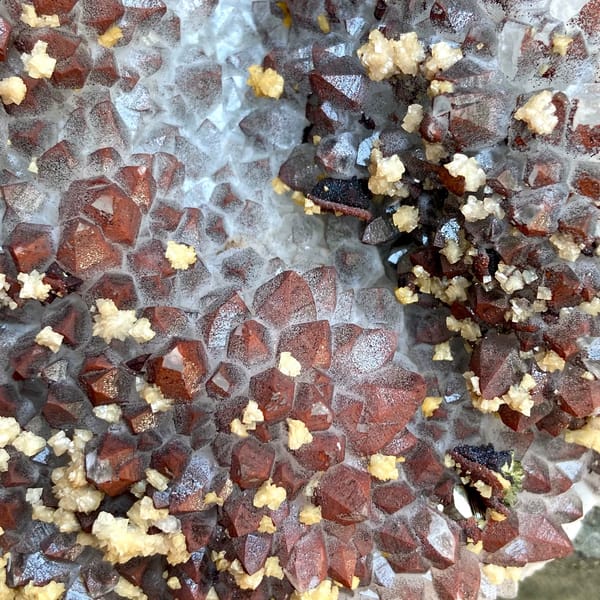 Red-skinned quartz plate with chalcopyrite and dolomite on stand from Jiangxi, China, reverse side