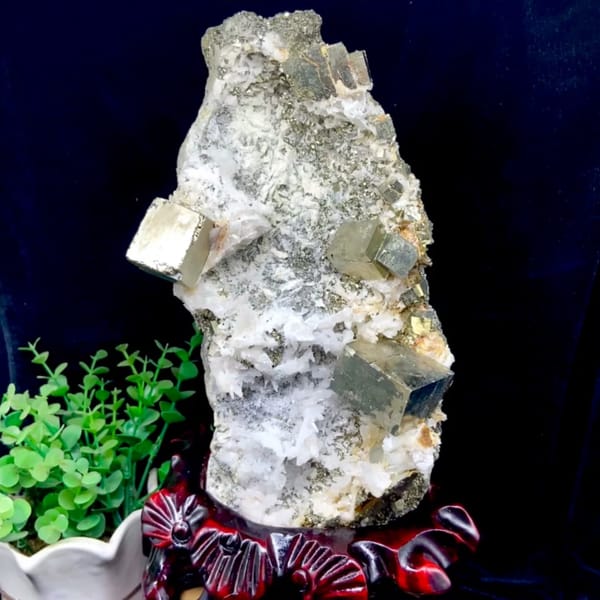 Pyrite and quartz tower on carved stand from Shangbao, Hunan, China