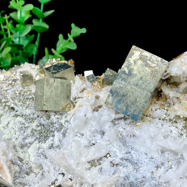 Pyrite and quartz tower on carved stand from Shangbao, Hunan, China, close-up of terminations