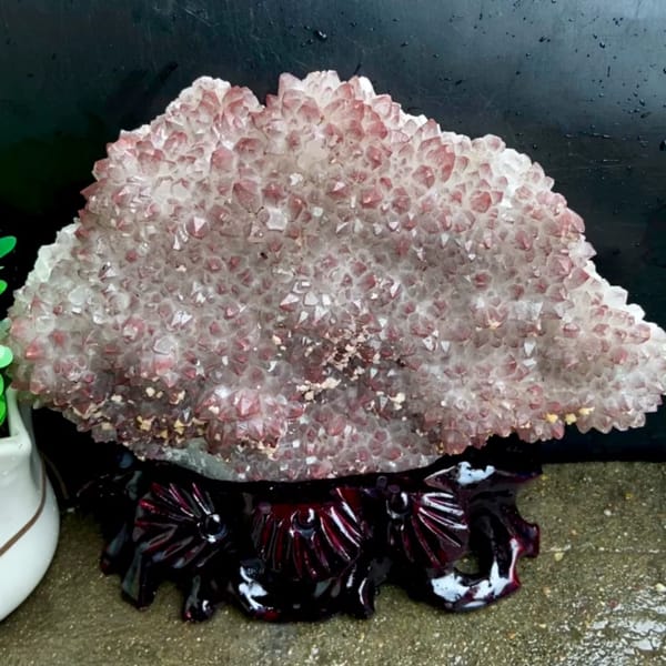 Fan of red-skinned quartz points with dolomite on stand from Jiangxi, China