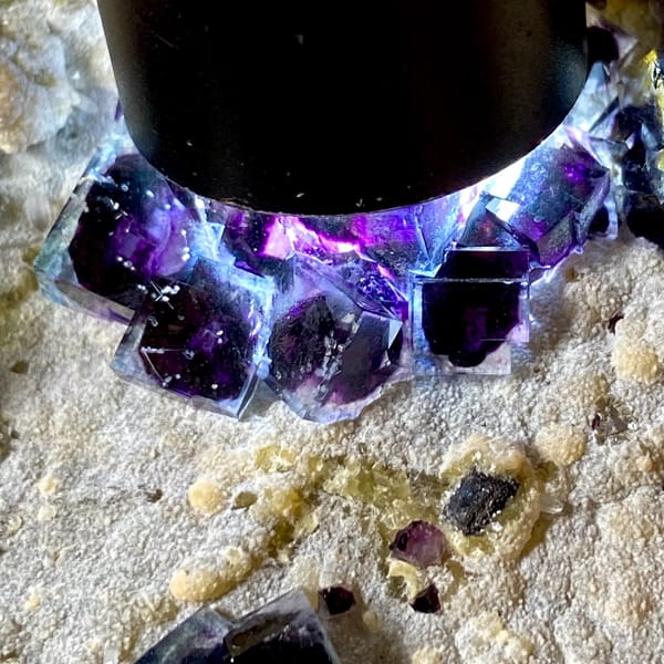 Plate of purple-cored window fluorite on stand from Inner Mongolia, China, reverse side