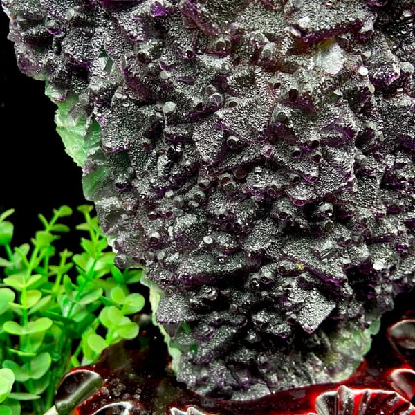 Large two-tone fluorite octahedra display piece on stand from Zhejiang, China, close-up of the crystal faces