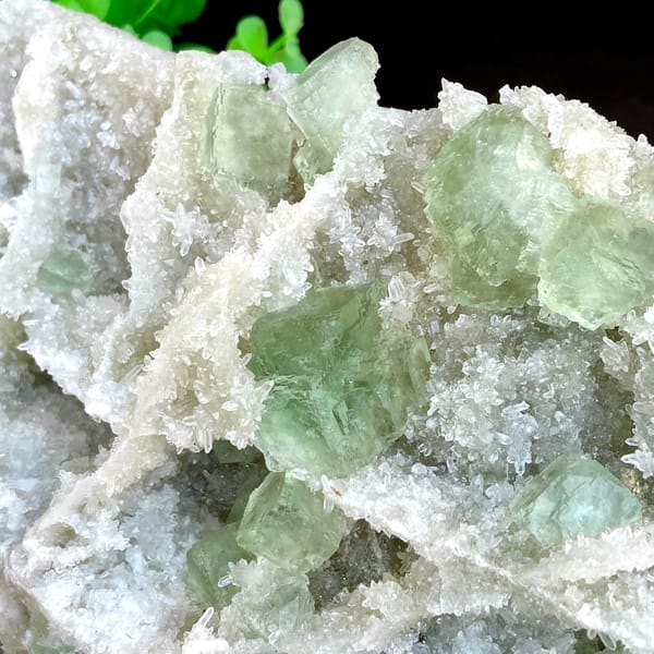 Large plate of pale green stepped fluorite over quartz from Fujian, China, top view